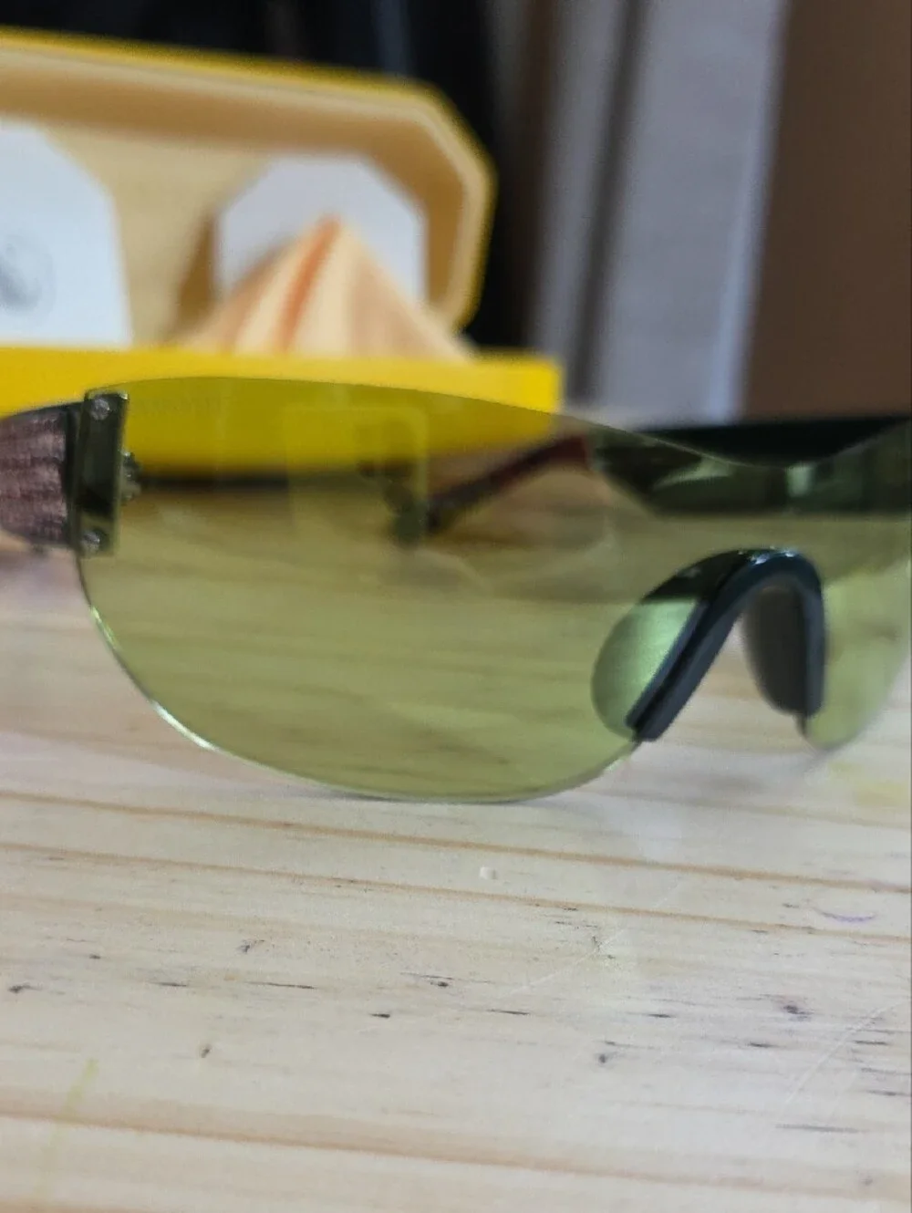 Swarovski Shield Sunglasses in Yellow-Green Tint